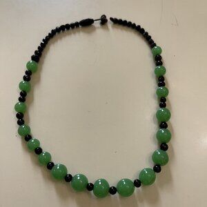 Green and black beaded 16 inch necklace with broken clasp